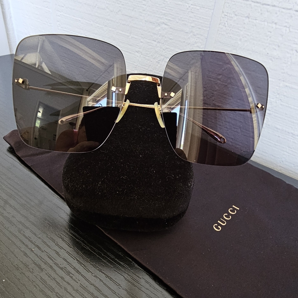Gucci GG1147S Gold black sunglasses
